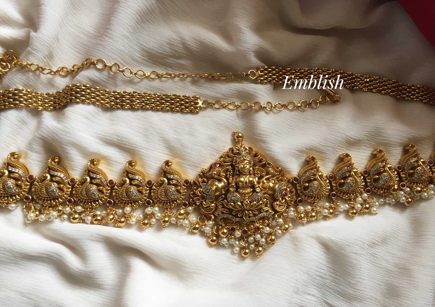 Gold alike Ad stones embedded dual beads Lakshmi peacock hipchain